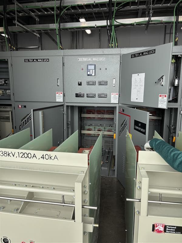 38 kV switchgear and medium-voltage cubicles with line and load side compartments open